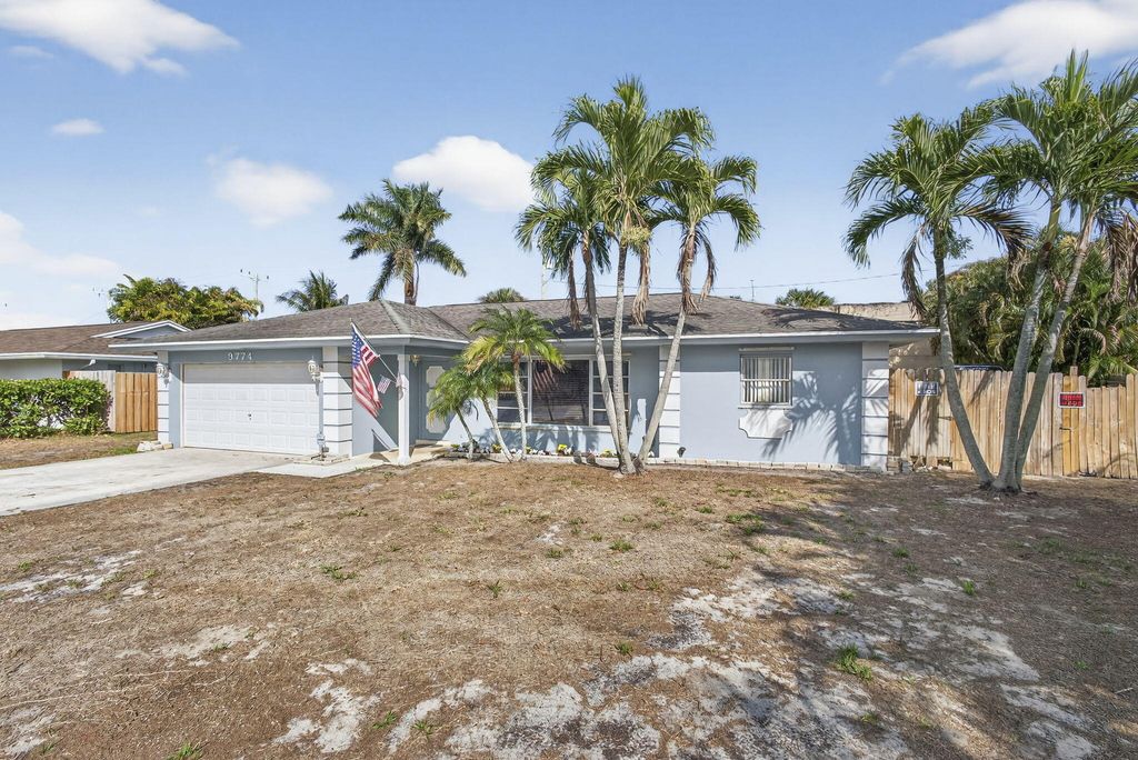 Photo of 9774 Jonquil Circle S, Palm Beach Gardens, FL 33410 (MLS # R11169158)