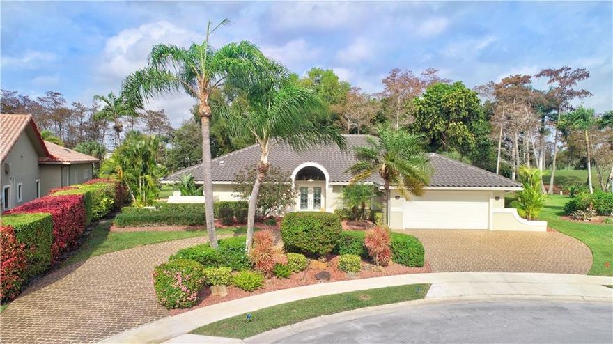 ONE OF THE BEST LOCATIONS IN BOCA WOODS... THIS HOME HAS BEEN RENOVATED AND IS A GEM. A RARE FIND ON THE END OF A CUL-DE-SAC STREET WITH TOTAL PRIVACY WITH A HUGE PAVED DECK & POOL.OPEN FLOOR PLAN -SPLIT BEDROOMS, NEW KITCHEN W STAINLESS APPLIANCES, NEW BA ROOMS, VINYL FLOORING, MARBLE, AC SYSTEM, LANDSCAPING, NEW PAINT INSIDE & OUTSIDE, INSIDE WINDOW SHUTTERS, CIRCULAR DRIVEWAY, ROOF IS 2016 & MUCH MORE.... 24 HOUR MANNED GUARD GATE, 2-18 HOLE PROFESSIONAL GOLF COURSES,  THIS HOME HAS BEEN WELL MAINTAINED AND IS READY FOR A NEW FAMILY.