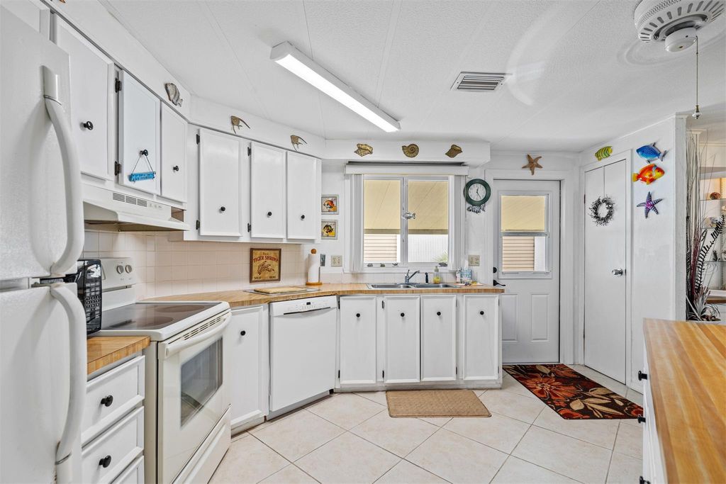 Photo of 261 NW 52nd Court, Deerfield Beach, FL 33064 (MLS # F10498648)