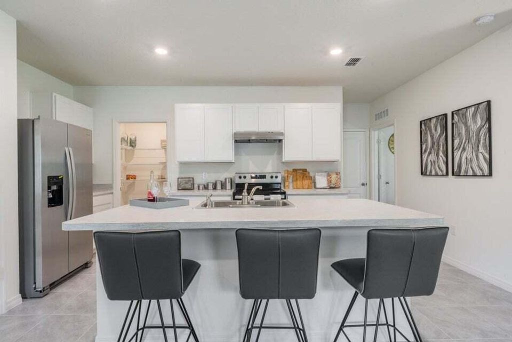 Photo of 9828 SW Sea Spray Drive, Fort Pierce, FL 34945 (MLS # R10986045)