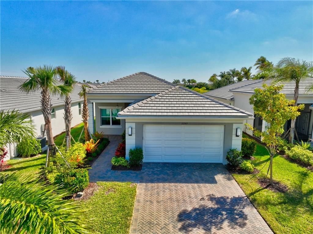 Photo of 11763 SW Moon River Way, Port St Lucie, FL 34987 (MLS # F10369389)