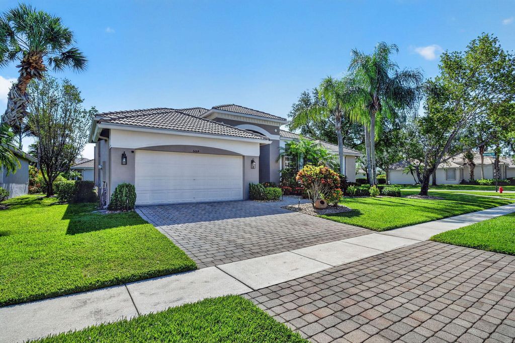 Photo of 6664 Murano Way, Lake Worth, FL 33467 (MLS # B26026007)