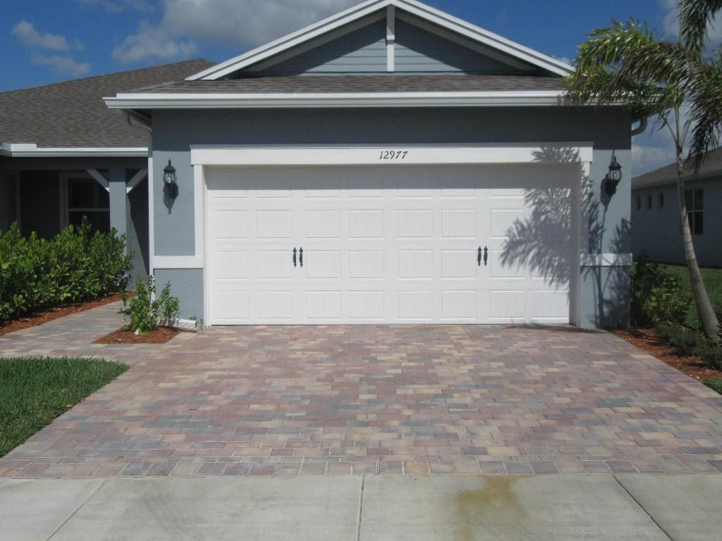 Photo of 12977 SW Gingerline Drive, Port Saint Lucie, FL 34987 (MLS # R10701746)