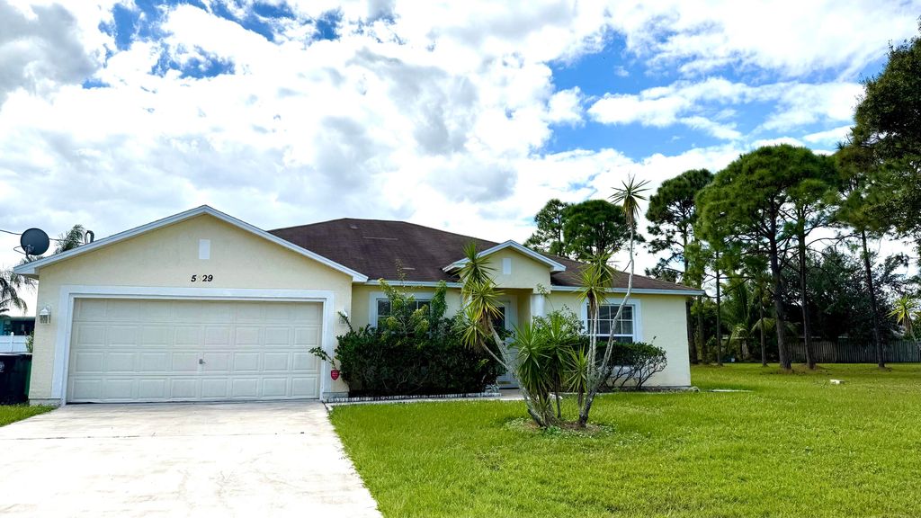 Photo of 5529 NW Lundy Circle N, Port Saint Lucie, FL 34986 (MLS # R11139027)