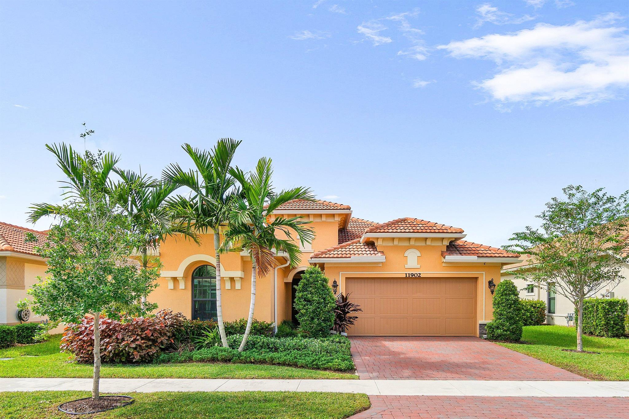 Welcome to your modern oasis at 11902 Palermo Road in Parkland, FL! This bright and cheerful 2,607 sq. ft. home offers an innovative layout with a special private suite featuring its own entry, living area with kitchenette, bedroom, bathroom, and laundry--perfect for a home office, adult children, or a caretaker. The main living area invites you to explore a gourmet kitchen that flows seamlessly into the dining area and great room, ideal for entertaining and everyday living. Stylish glass barn doors open to a versatile office/den space. Enjoy seamless indoor-outdoor living with a screened-in patio and fenced yard. With 3 full bedrooms and 3.5 bathrooms, this home provides ample space for everyone. This property combines space with style, offering a modern lifestyle in a vibrant community.