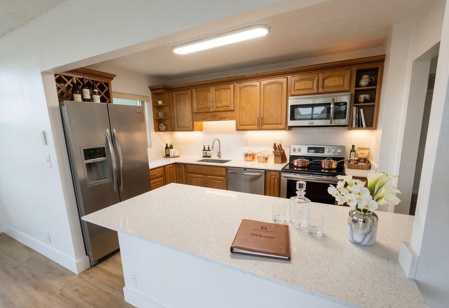 Experience refined living in this stunning, fully renovated 2BR/2BA top-floor end unit in Hollywood's Watergate community. This bright home features a modern open floor plan, elegant new countertops, and stainless steel appliances. Enjoy the privacy of having no upstairs neighbors and beautiful wood flooring throughout. Relax on your spacious screened balcony with water and internet conveniently included in the rent. The community offers 2 pools (one heated), a gym, billiards, and a clubhouse, with laundry facilities on the same floor. Perfectly located near I-95 & Sheridan. Vacant and move-in ready! No pets or smoking permitted. Association approval takes approximately 3 weeks, and renter's insurance is required. Professionally managed by PMI.