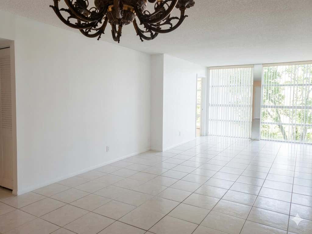 Photo of 801 THREE ISLANDS Boulevard #303, Hallandale Beach, FL 33009 (MLS # B26051917)