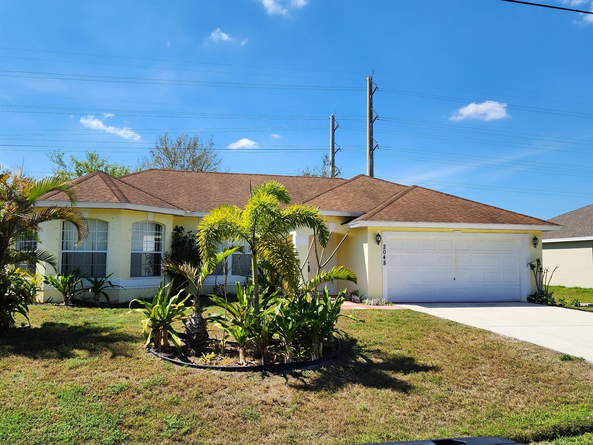 Spacious 3 BR 2 BA 2 CG rental in western PSL. Tile throughout, private backyard. Great location with easy access to I95 and Traditions. First, Last and Security is required. No Pets. Available now.