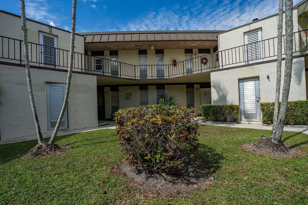 Photo of 2 Greenway Vlg N #210, Royal Palm Beach, FL 33411 (MLS # B26009638)