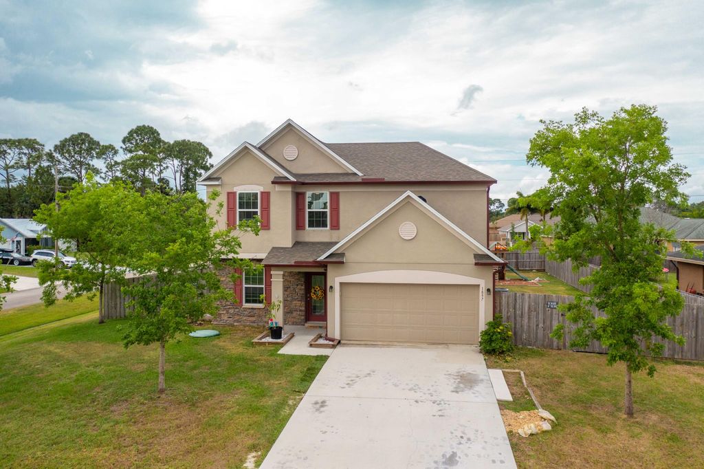 Photo of 1897 SW Whipple Avenue, Port Saint Lucie, FL 34953 (MLS # R10796291)