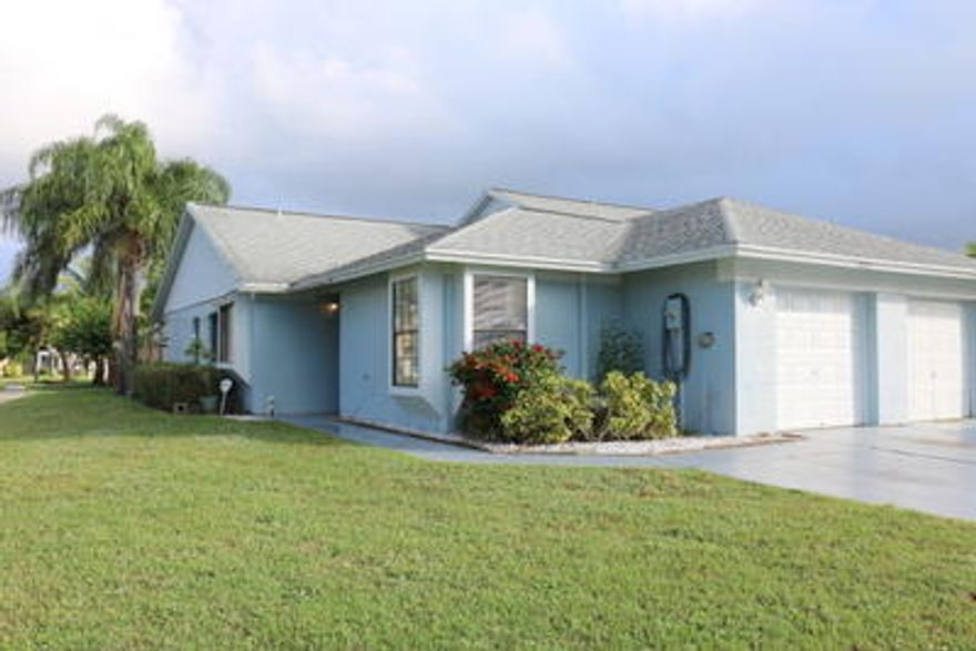 Hurry up...This 3/2 villa in Lake Worth will go quick!  This home features expansive Cathedral ceilings, skylights, updated kitchen with Granite counter-tops, French doors that lead to a gigantic enclosed porch and a fenced in brick paver patio.  The HOA fees are super low and the location of this unit is phenomenal as it is across from the pool,tennis courts and basketball courts.  I'm telling you...call today because tomorrow may be too late!