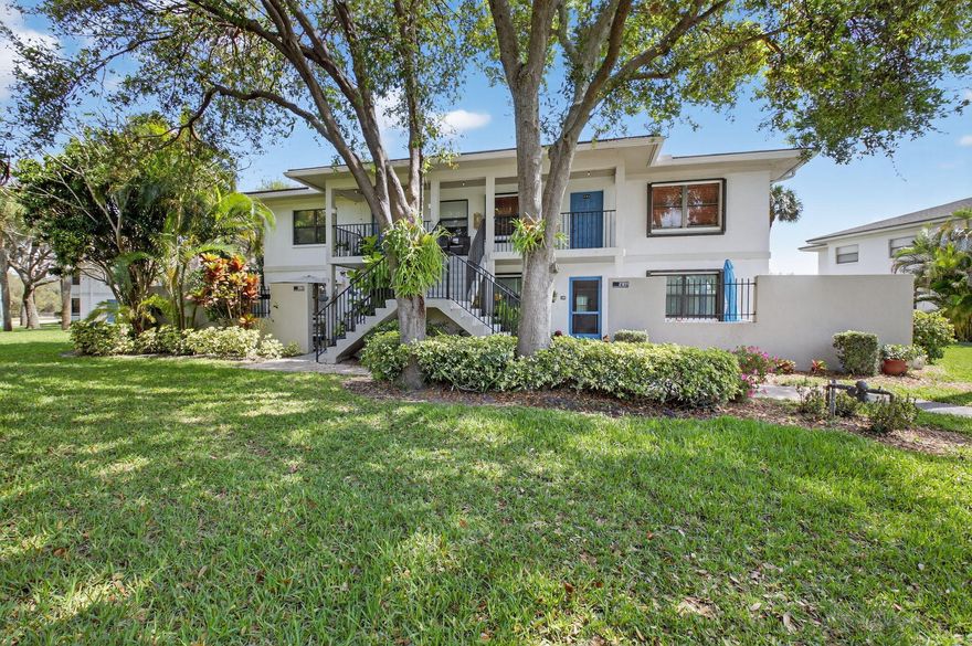 Welcome to this spacious and beautifully situated second-floor unit in the desirable Delray Oaks community, offering peaceful lake views and over 1,300 square feet of comfortable living space. This well-maintained 2-bedroom, 2-bath residence features a thoughtfully designed split-bedroom floor plan that provides both privacy and functionality, making it ideal for full-time residents, seasonal owners, or investors. As you enter, you're greeted by a bright and open living and dining area with ample space for both relaxing and entertaining. The open layout flows seamlessly into a spacious eat-in kitchen, complete with generous cabinetry, ample countertop space, and a convenient full-size washer and dryer discreetly located within the kitchen area. The oversized primary suite offers a quiet  retreat with two large walk-in closets providing abundant storage. The ensuite bathroom includes a private vanity area and full bath, offering both comfort and convenience. The split layout places the guest bedroom on the opposite side of the unit, making it perfect for visiting guests, a home office, or additional living space. A second full bathroom is located nearby. Additional upgrades and features include accordion hurricane shutters for peace of mind during storm season, a tankless water heater for energy efficiency, an updated electrical panel, freshly painted interior, and numerous closets and storage areas throughout the home. The unit is ideally positioned within the community with convenient assigned parking just steps away, along with plentiful guest parking for visitors. Residents of Delray Oaks enjoy a range of amenities designed to complement the South Florida lifestyle, including a community pool, clubhouse, and a scenic walking path that winds around the lake. Directly across the street is a protected nature preserve, offering additional green space and opportunities to enjoy the outdoors. Located in the heart of Delray Beach, the property offers easy access to major roadways including I-95 and is just minutes from shopping centers, dining, entertainment, and beautiful Atlantic beaches. Residents are also close to everyday conveniences like Costco, as well as the vibrant restaurants, boutiques, and nightlife along Atlantic Avenue. The area also provides access to highly regarded schools and nearby colleges. Whether you're seeking a full-time residence, seasonal retreat, or investment opportunity, this lakefront condo combines spacious living, desirable amenities, and an exceptional location in one of Delray Beach's most convenient communities.