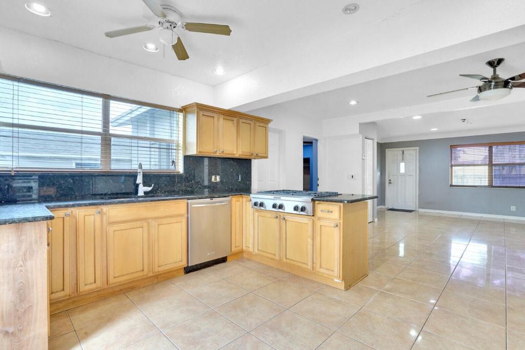 Photo of 3230 Buccaneer Road, Lake Worth, FL 33462 (MLS # R10970450)