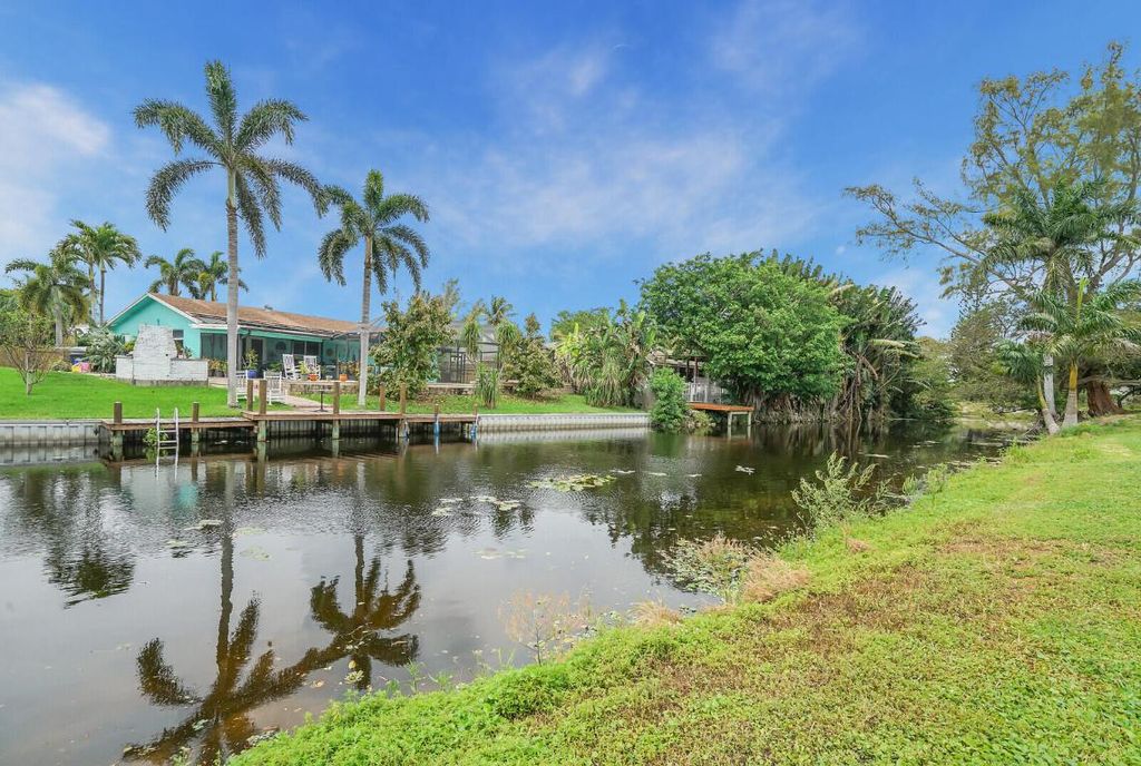 Photo of 3230 Buccaneer Road, Lake Worth, FL 33462 (MLS # R10970450)