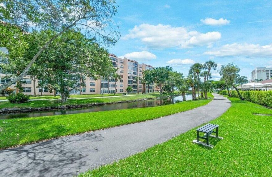 Come Live the South Florida Dreamy lifestyle in this large corner 2 bedroom, 2 bath home with lake VIEWS.  Over 1250 sf in Huntington Lakes, a 24 manned GATED and very active 55+ community in Delray Beach, Florida. New glass enclosure with screens gives you additional space to enjoy your morning coffee or your afternoon siesta. Eat in kitchen with large pantry. Stainless steel appliances Full size washer and dryer in your own laundry room with closet. Unit has newer ac. Large primary bedroom with two walk-in closets and sitting area.  Private entrance to second bath from second bedroom.  Incredible newly renovated clubhouse with indoor pool, saunas, pickleball, tennis, many FREE classes for residents, entertainment, movies, cards rooms, fitness centers, ping pong, billiards. This home has an amazing location in Delray Beach with tons of grocery stores nearby like Aldi, multiple Publix's, Glicks, Boys, and more. Houses of worship, tons of stores, salons, restaurants all nearby. And 15 minutes to the beach. Yearly rental preferred with good credit.