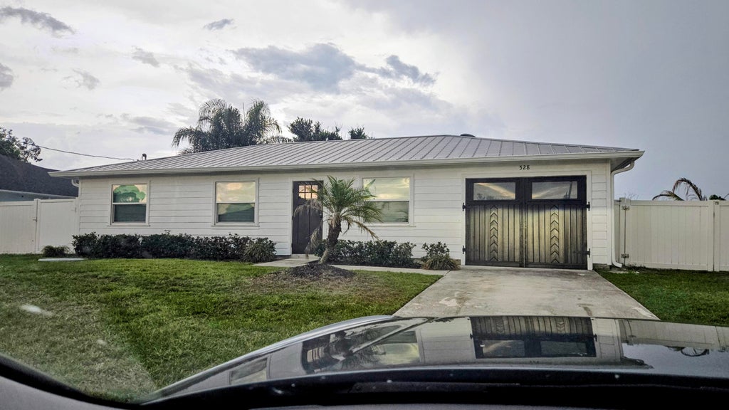 Photo of 528 SW RYAN Avenue, Port Saint Lucie, FL 34953 (MLS # B26070697)