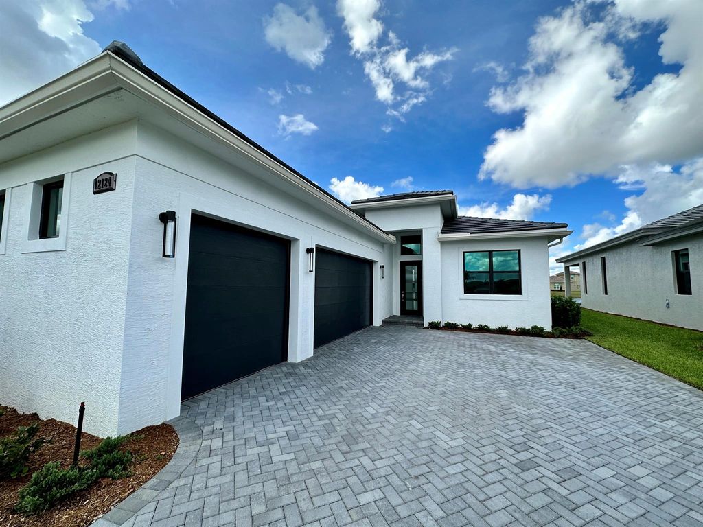 Photo of 12124 SW Fortezza Way, Port St Lucie, FL 34986 (MLS # R10913538)