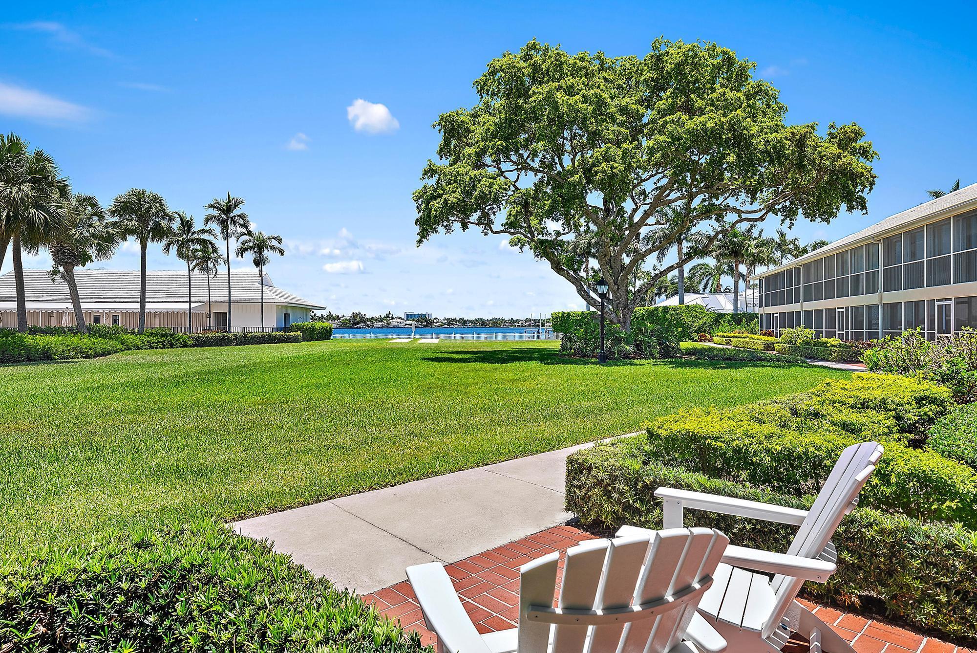 Charming Waterfront Retreat in Lost Tree Village Located in one of the most sought-after waterfront enclaves, this beautifully styled residence offers effortless living with a bright, coastal ambiance and direct views of Little Lake Worth and manicured grounds. The open living and dining areas are framed by floor-to-ceiling glass, inviting in natural light and showcasing tropical landscaping and sparkling water beyond. The updated kitchen features stainless steel appliances, light wood cabinetry with glass inlays, and a breakfast bar that seamlessly flows into the living space--perfect for entertaining or enjoying a quiet morning at home. Tasteful finishes and thoughtful design details bring a modern coastal flair while maintaining a warm, welcoming tone throughout.