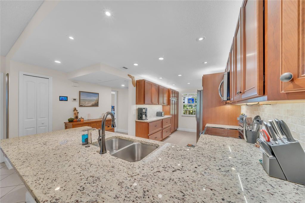 Photo of 550 Oaks Lane #201, Pompano Beach, FL 33069 (MLS # F10463647)