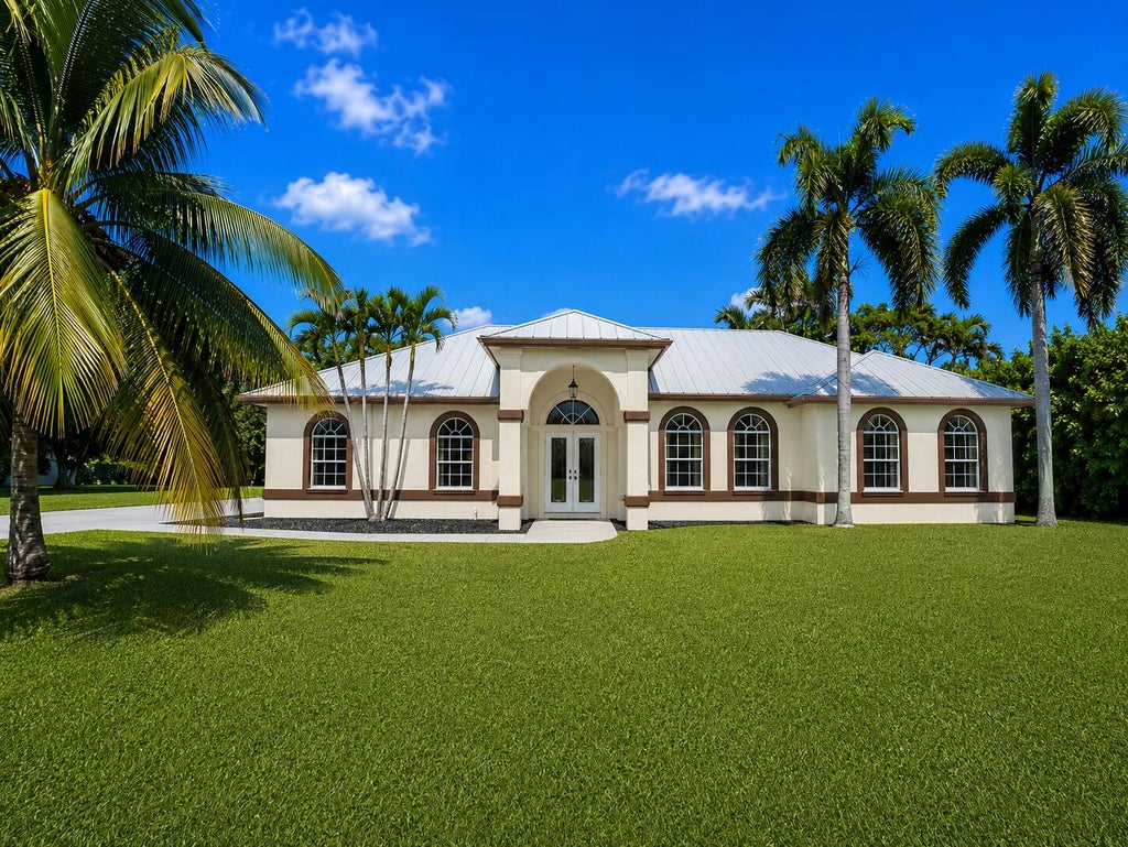 Photo of 13383 Temple Boulevard, West Palm Beach, FL 33412 (MLS # B26017657)