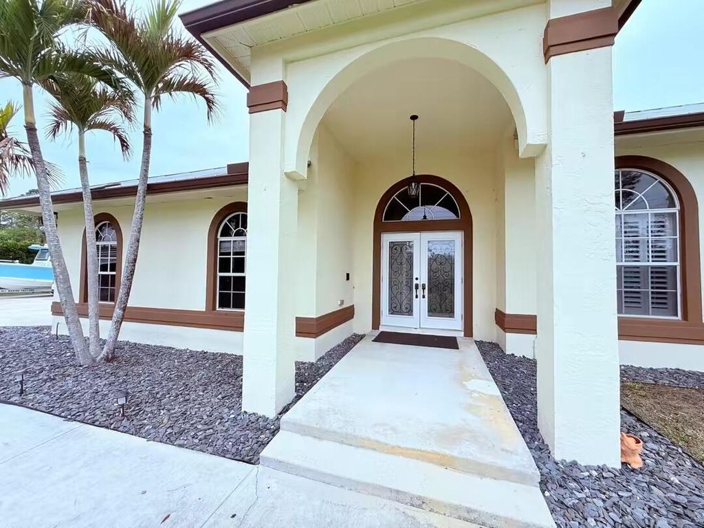 Photo of 13383 Temple Boulevard, West Palm Beach, FL 33412 (MLS # B26017657)