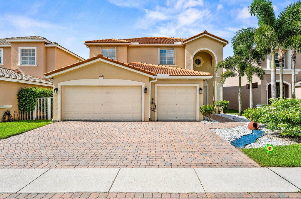Photo of 7048 Via Leonardo, Lake Worth, FL 33467 (MLS # B26040108)
