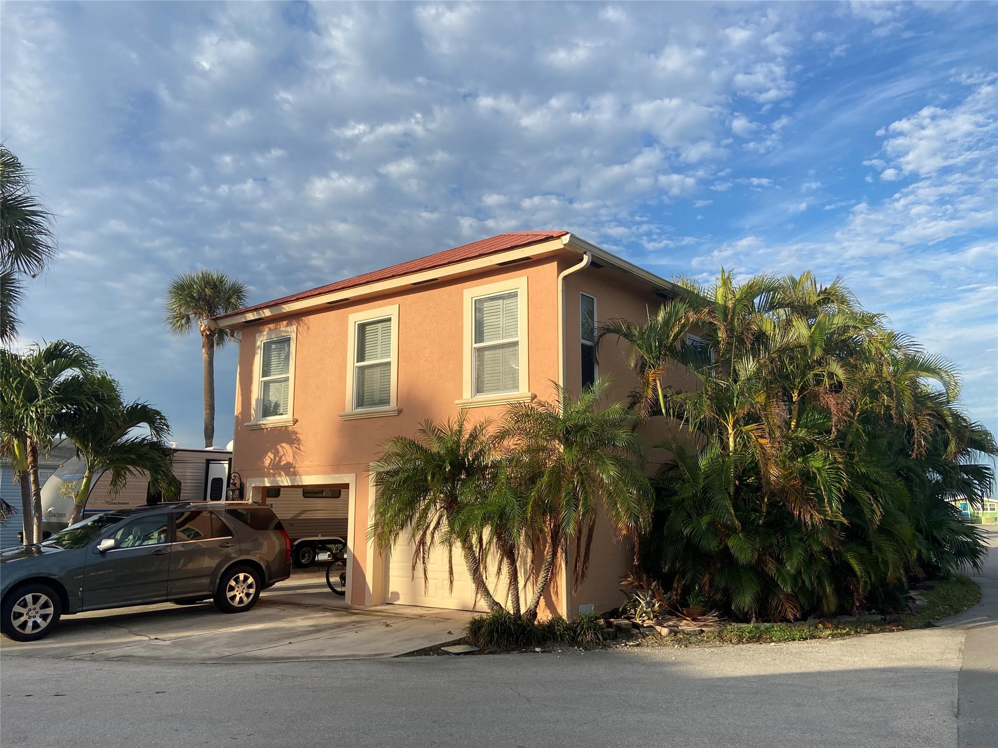 Take in the sunset over Indian River Lagoon every evening from this 4BR home with deeded ocean access. Enjoy resort amenities including a large heated pool, marina, boat ramp, pickle ball and tennis courts, pool hall, wood shop, fishing area, and lots of community activities. Equipped with modern appliances, attractive decor, and convenience to all that Hutchinson Island has to offer. Property features cathedral ceilings, granite counters, tile floors, a screened porch, and expansive window views. Tie up your boat at our marina for a modest fee -- slips are available! Offered fully-furnished and kitchen equipped, or bare if you prefer. Parking for 3 vehicles. Add'l paid parking available in the RV storage lot.