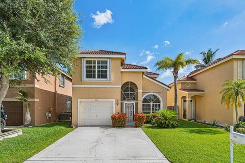 Photo of 7835 Springfield Lake Drive, Lake Worth, FL 33467 (MLS # B26050481)
