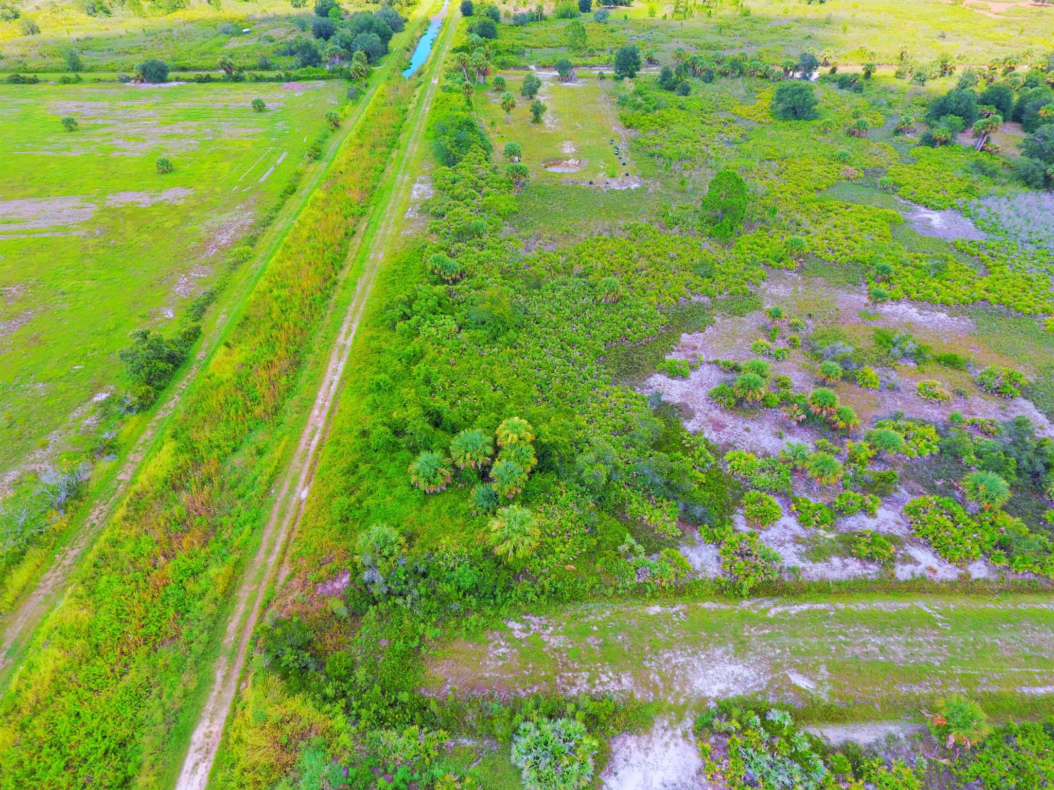 Escape to wide open freedom on this stunning 1.25 acre parcel in the heart of Viking Estates, a rural gem in Okeechobee, FL. Zoned Agricultural, this land offers incredible versatility - perfect for a custom home, weekend getaway, or investment. Want a garden, barn, or workshop? You've got the green light. This zoning isn't just about livestock - it's about freedom, flexibility, and future opportunity. No HOA, no city hassle - just blue skies, fresh air, and your vision coming to life. Located in a peaceful area with wild dirt roads and endless country charm, yet just a short drive to town for convenience. Make your move to the quiet side of Florida living today!