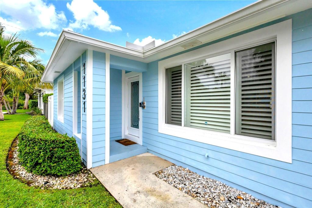 Photo of 1131 Surf Road, Singer Island, FL 33404 (MLS # B26031456)