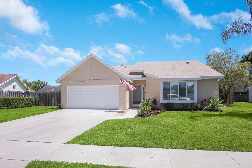 Photo of 149 Roycourt Circle, Royal Palm Beach, FL 33411 (MLS # R10787310)