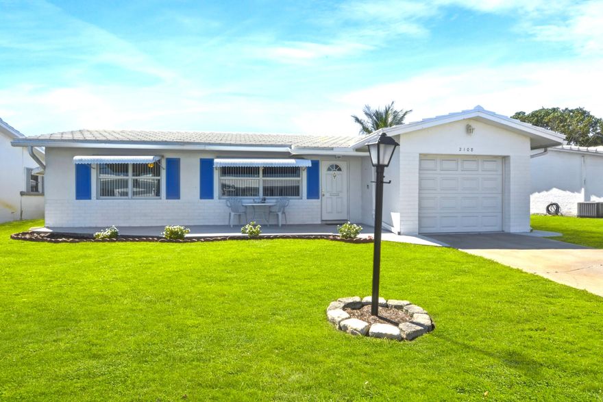 Spacious backviews from this lovely 2BR/2BA Edgewood Model home.  Full Florida room plus both front and back patios.  Thousands in upgrades including ALL HURRICANE IMPACT WINDOWS, ROOF REPLACED 2018, AC 2019, KITCHEN APPLIANCES REPLACED.  Tile flooring and carpeting in bedrooms.  Active 55+ Community with lots of amenities including heated community pool, fitness center, pitch & putt FREE golf, active clubhouse. Minutes to I95, ocean beaches, shopping, banking and restaurants.  A MUST SEE...Guest bedroom virtually staged.