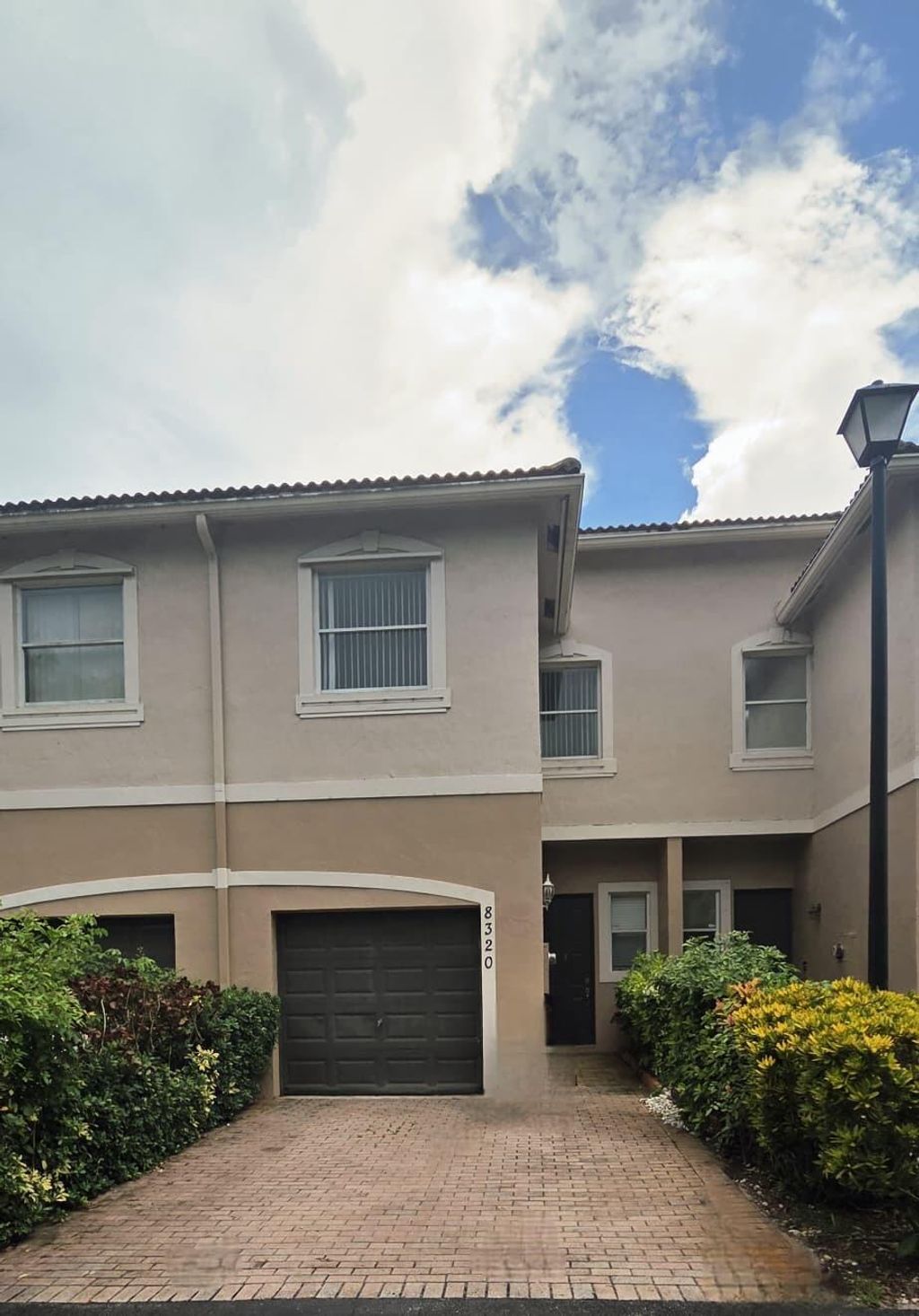Photo of 8320 Lagos De Campo Boulevard, Tamarac, FL 33321 (MLS # B26045827)