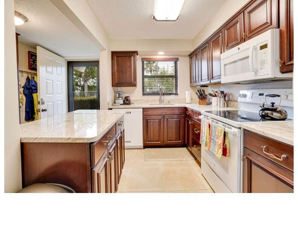 Photo of 1300 Seaway Drive #2, Fort Pierce, FL 34949 (MLS # B26020059)