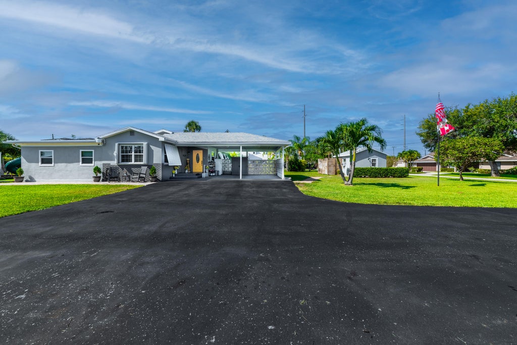 Photo of 7100 Thompson Road, Boynton Beach, FL 33426 (MLS # R11048093)