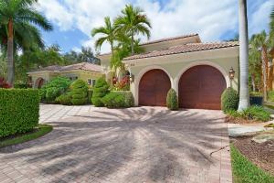 This exquisitely upgraded Talavera model has a wonderful one level floor plan, great for entertaining. The hand-selected upgrades throughout the formal living area, gourmet kitchen, grand master bedroom and study give this home a truly custom appeal!  The private back patio and pool area offers a covered pecky cypress lanai with built-in fireplace, summer kitchen, lush tropical pool w/decorative fountain and steps leading down to the custom diagonally laid 70-ft dock overlooking private greenery area.  This home offers a spacious master suite w/views of the waterway and separate his/hers walk-in closets, oversized bath w/Jacuzzi tub.  There are three additional bedrooms, each with its own full bath and decorative marble accents.  Large family room opens to kitchen and breakfast nook.