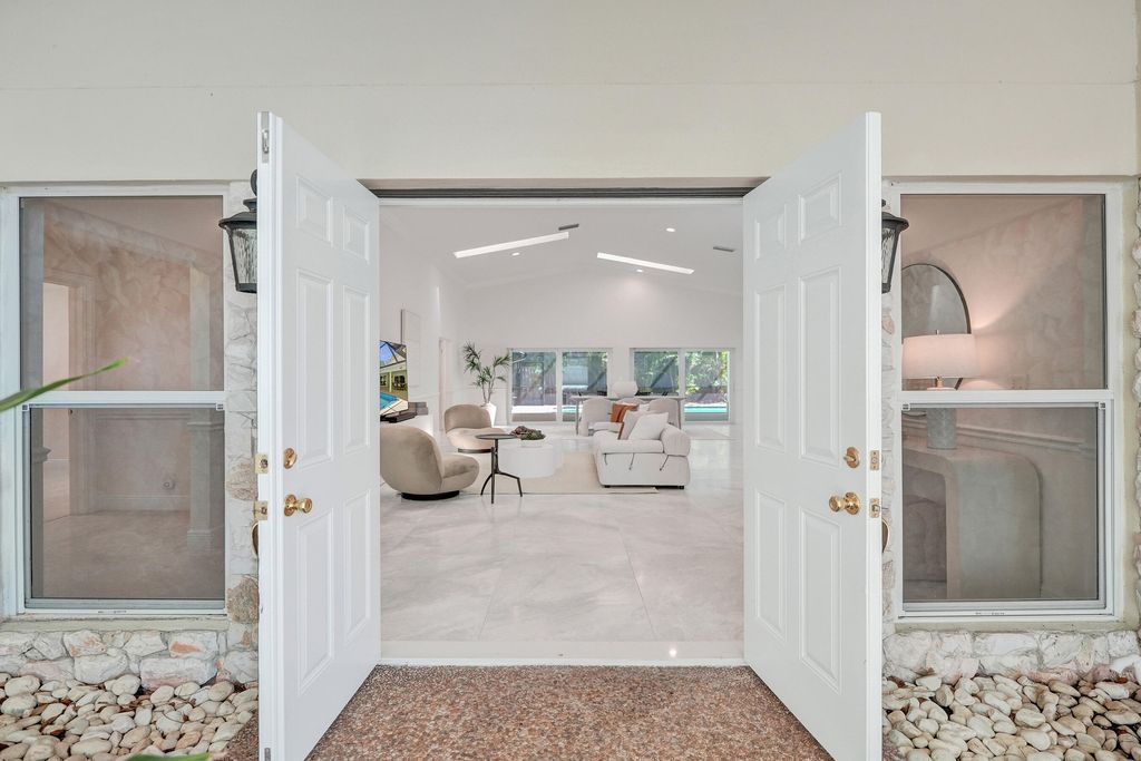 Photo of 2401 NW 39th Street, Boca Raton, FL 33431 (MLS # B26023176)