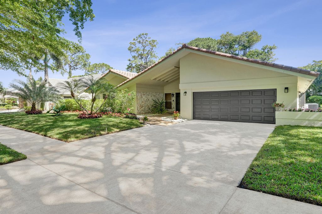 Photo of 2401 NW 39th Street, Boca Raton, FL 33431 (MLS # B26023176)