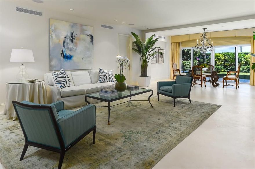 Exquisitely renovated garden apartment in the chic 300 Building. The expert renovation was undertaken by Sloan Construction, one of Palm Beach's premier builders. Only the best of the best was used - hand-painted Gracie and Co. wallpaper, Haifa French limestone flooring, Stark carpeting and Sub-Zero and Bosch appliances. Other high-end selections include beautiful marble bathrooms and kitchen, impact windows and doors and quality finishes. The master bedroom and guest bedroom look out to the garden. A third bedroom and bathroom was created to accommodate visitors or to be used as an office. The 9' ceilings help create a light, bright space and the interior can be easily transformed from classic elegance to contemporary by choice of furnishings. This apartment offers the