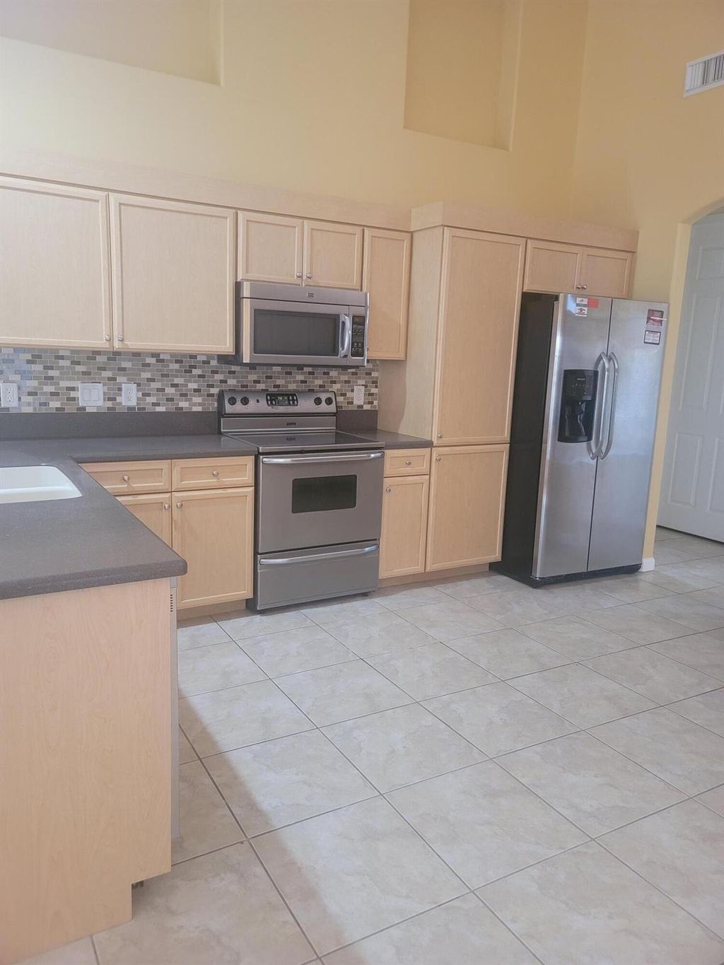 Photo of 981 SW Abingdon Avenue, Port Saint Lucie, FL 34953 (MLS # R11005575)