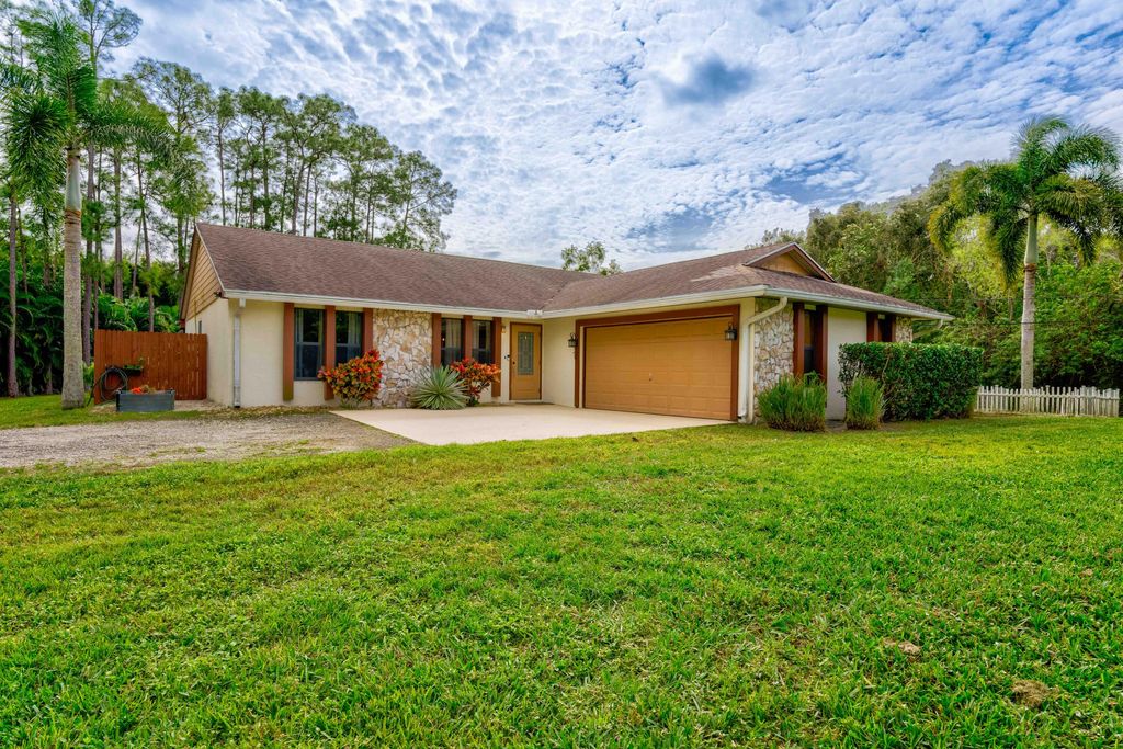 Photo of 12448 154th Road N, Jupiter, FL 33478 (MLS # R10952850)
