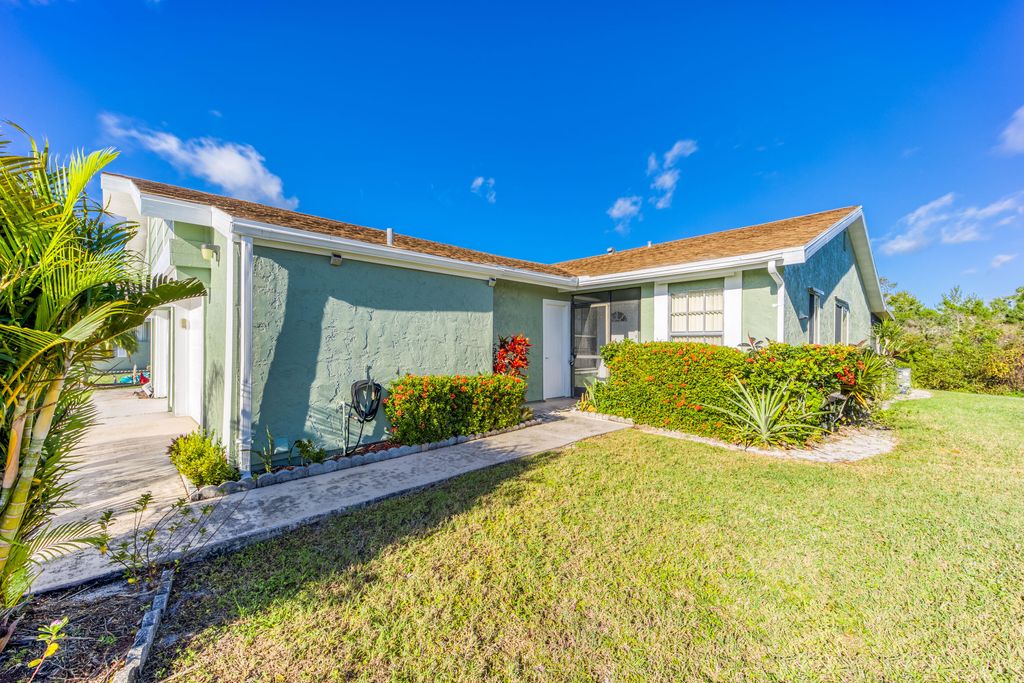 Photo of 1427 SE Larkwood Circle, Port Saint Lucie, FL 34952 (MLS # R10944862)