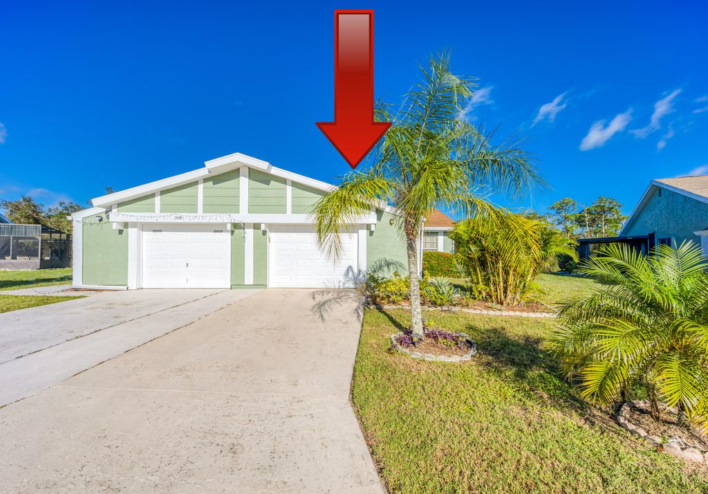 Photo of 1427 SE Larkwood Circle, Port Saint Lucie, FL 34952 (MLS # R10944862)