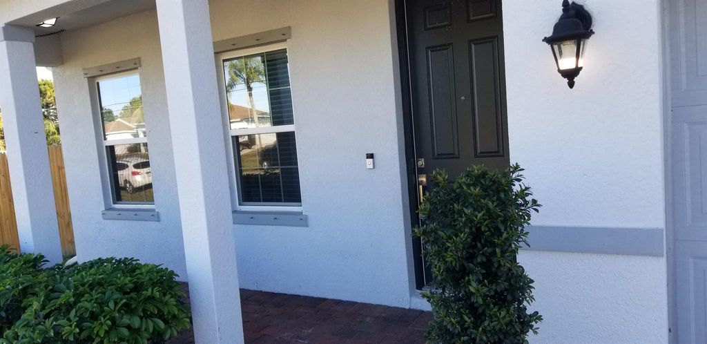 Photo of 632 SW Mccoy Avenue, Port Saint Lucie, FL 34953 (MLS # R11019400)