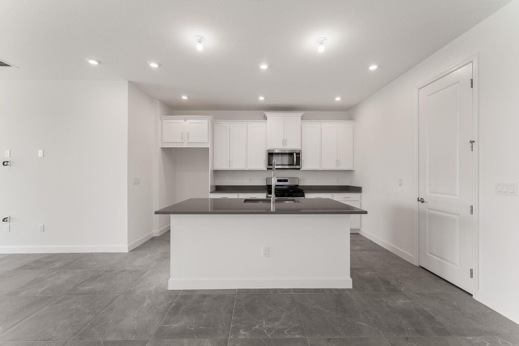 Photo of 13501 SW Bally Drive, Port Saint Lucie, FL 34987 (MLS # R11078396)
