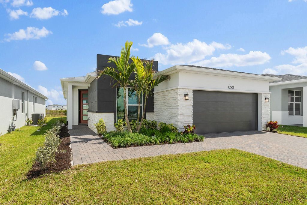 Photo of 13501 SW Bally Drive, Port Saint Lucie, FL 34987 (MLS # R11078396)