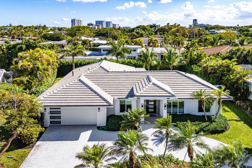 Welcome to Sun and Surf, one of Boca Raton's most coveted coastal communities. Just across A1A from the beach and adjacent to Red Reef Golf Course, this family-friendly enclave offers the perfect combination of walkability, tranquility, and luxury living.This residence was fully renovated down to the studs in 2023, including a brand-new roof, ensuring every system, surface, and finish has been thoughtfully modernized for today's lifestyle. Inside, a breathtaking open-concept design showcases a chef's kitchen with custom cabinetry, designer finishes, and expansive prep space that flows seamlessly into the dining and living areas The home features four spacious bedrooms, while each bath is finished with custom designer tile work for a spa-like feel.