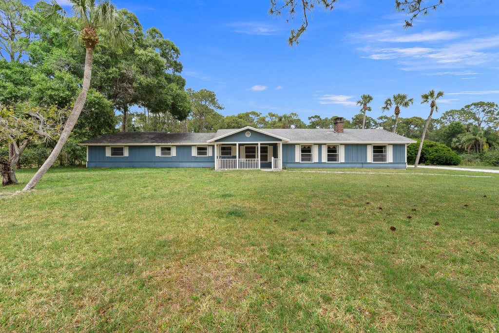 Photo of 6325 SW Gator Trail, Palm City, FL 34990 (MLS # R11084521)