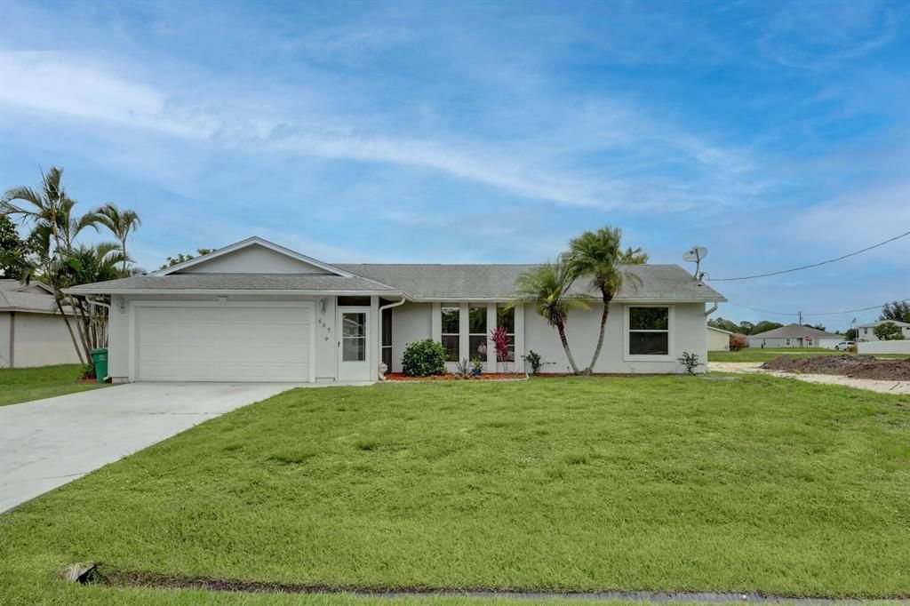 Photo of 605 NW Marion Avenue, Port St Lucie, FL 34983 (MLS # R10731267)