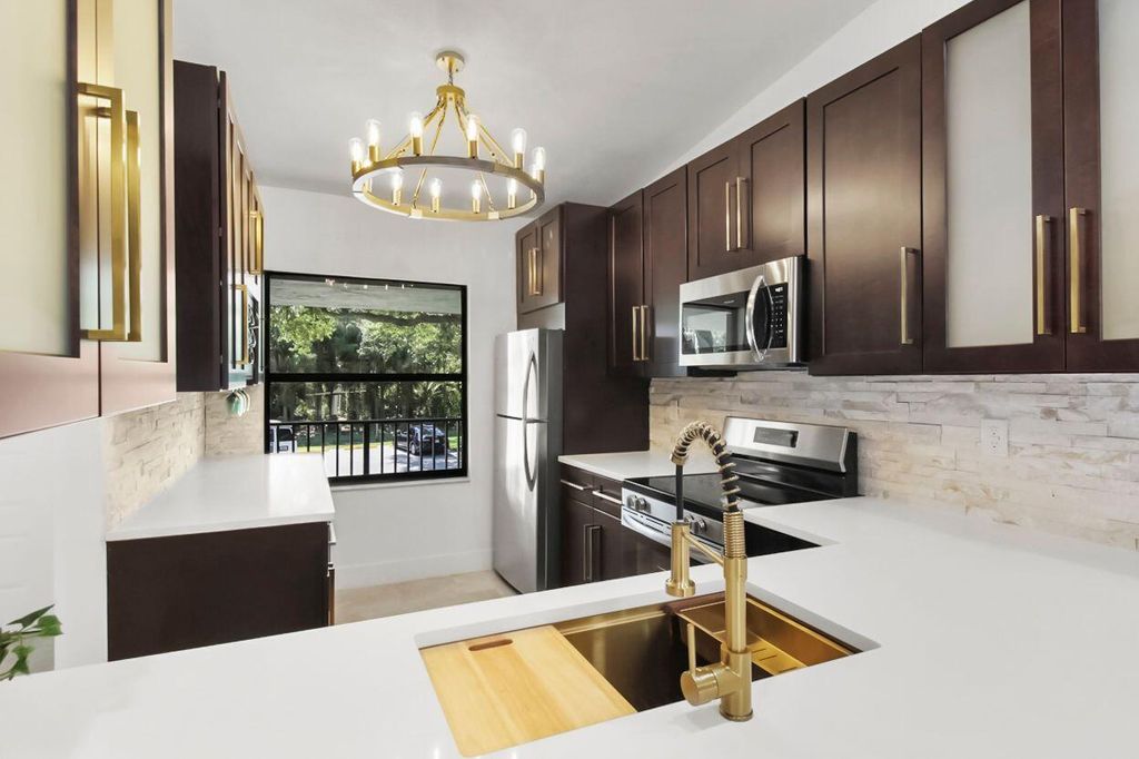 Photo of 1001 Sabal Ridge Circle #F, Palm Beach Gardens, FL 33418 (MLS # R10990714)